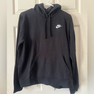 All black hooded Nike sweatshirt
